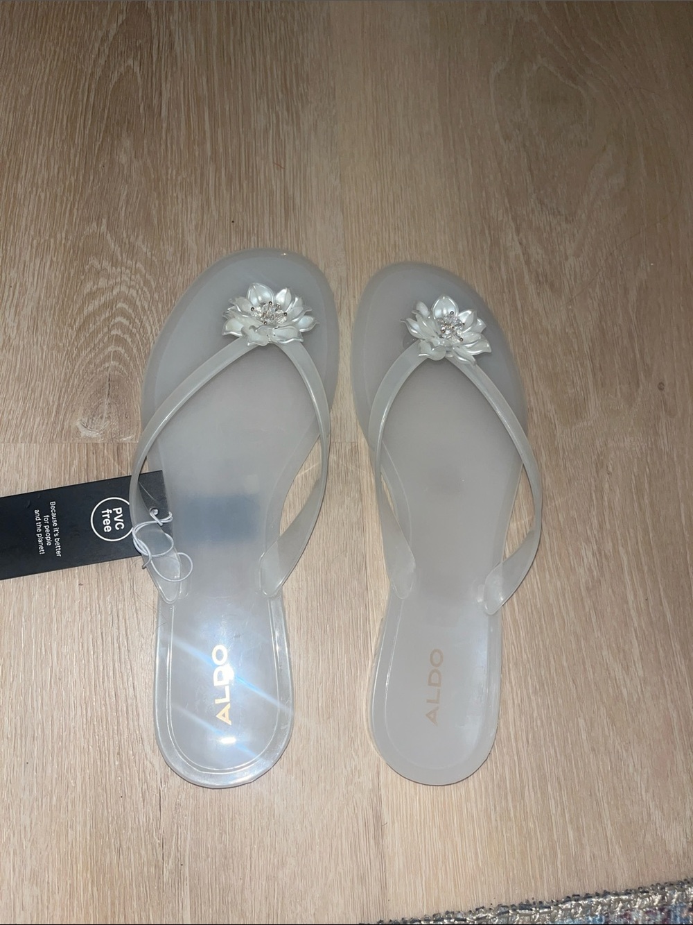 ALDO Clear Jelly Flip Sandals with Floral Accent - Clear